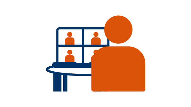 Person sitting in front of a laptop on a video call.